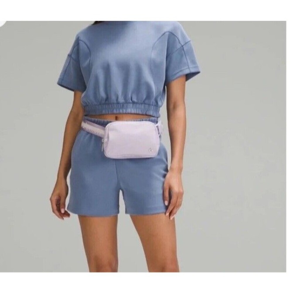 Lululemon Athletica everywhere belt bag in lilac ether/white opal/white.